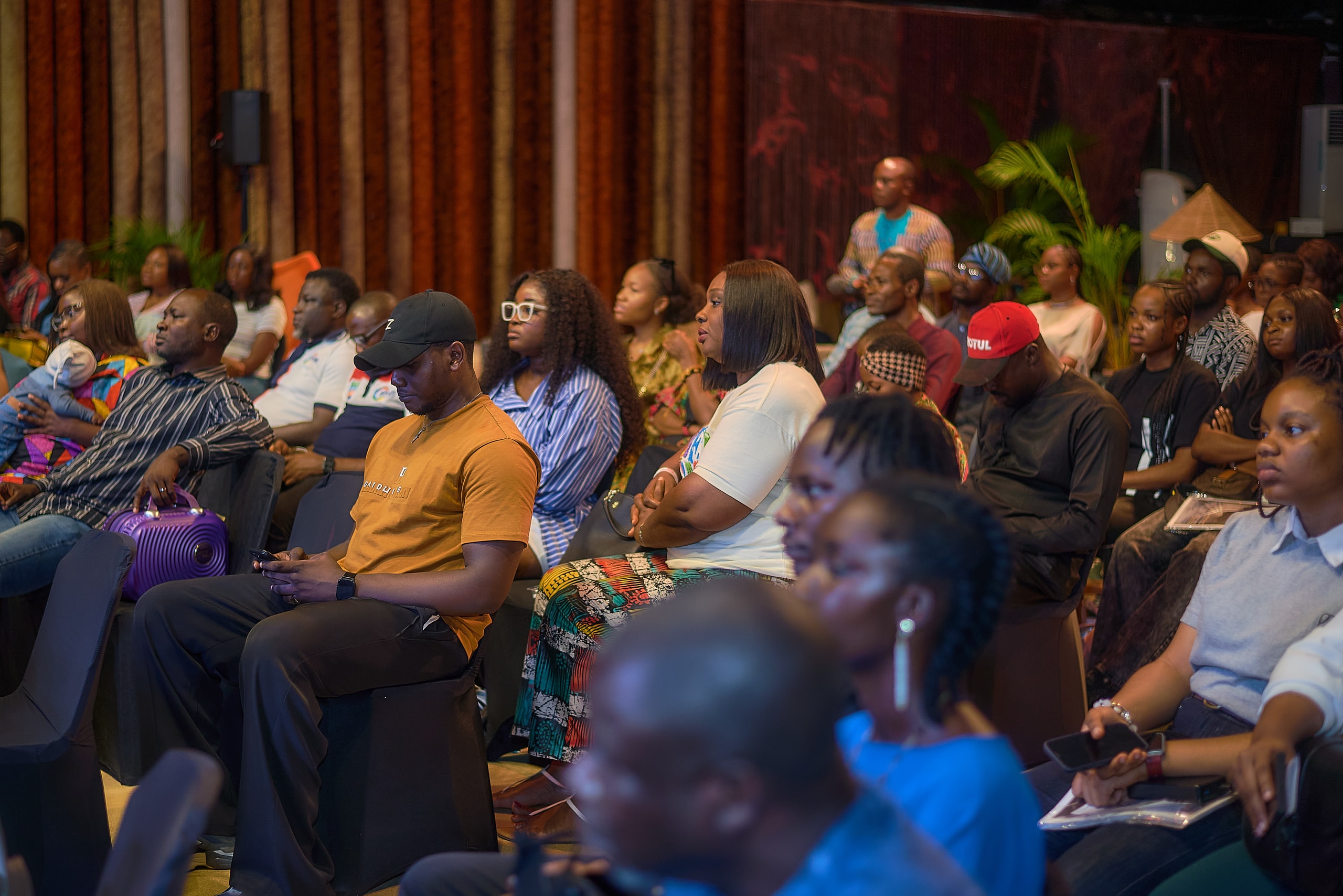 An audience seated at an IDAN gathering